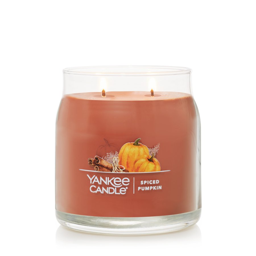 burning spiced pumpkin signature jar candle