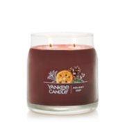 burning holiday zest signature jar candle image number 2