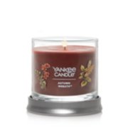 signature autumn wreath small tumbler candle lit with base as coaster image number 1