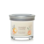 white spruce and grapefruit signature candle with lid