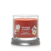 burning sugared cinnamon apple signature candle on lid as base image number 1