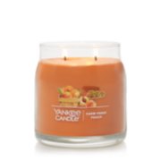 burning farm fresh peach signature medium jar candle image number 2