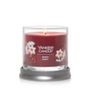 signature merry berry small tumbler candle lit with lid as coaster image number 1