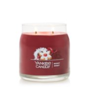 merry berry signature medium jar candle lit image number 1