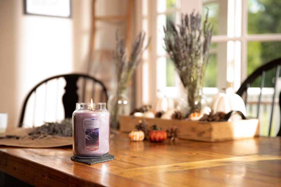 dried lavender and oak large jar candles on table