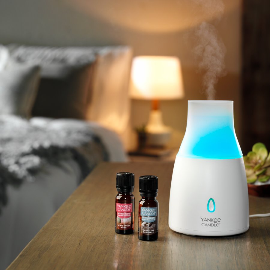 ultrasonic diffuser with home sweet home and warm luxe cashmere diffuser blends in bedroom