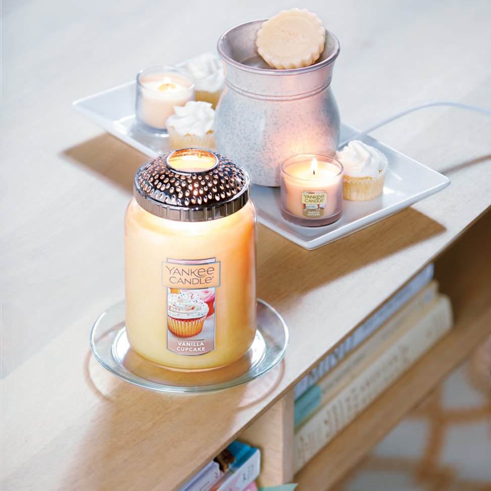 vanilla cupcake large jar candle with iluma lid on tray mini candles and wax melt warmer on tray