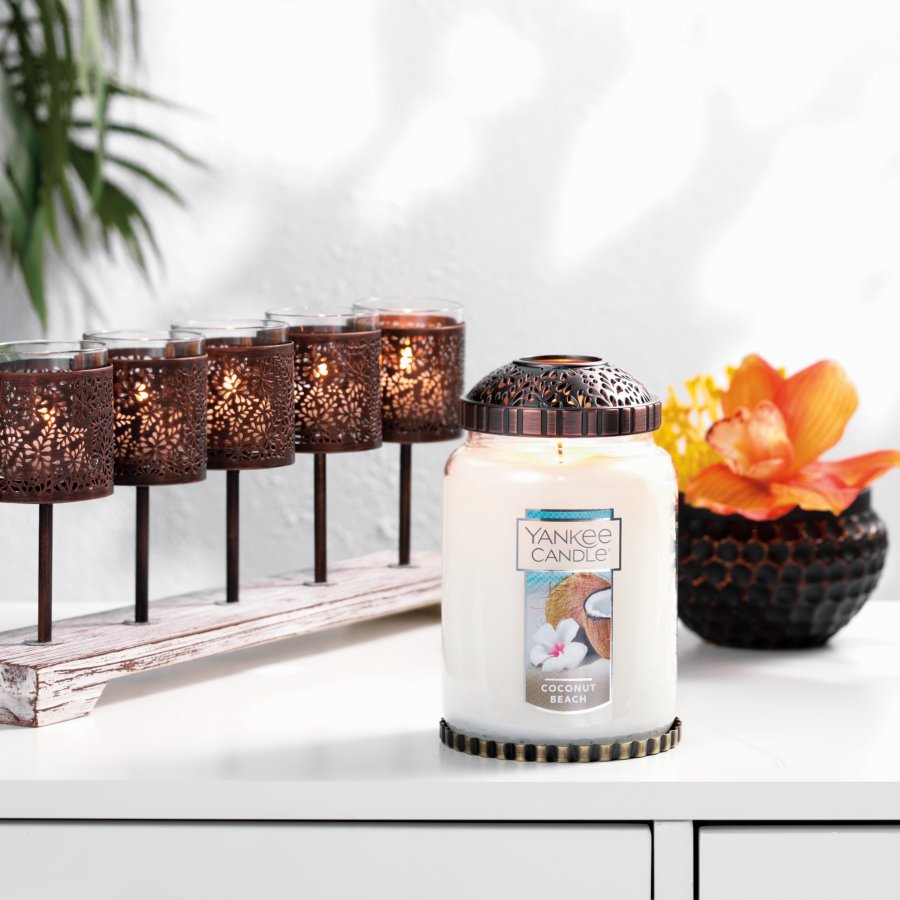 coconut beach large classic candles with illuma lid on tray and multi tea light holder on desk
