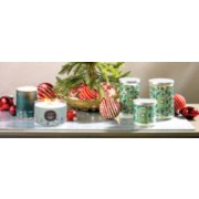 range of tumbler candles on table with decorative items image number 2
