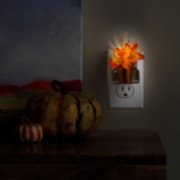 fall flowers scentplug diffuser plugged into outlet image number 2