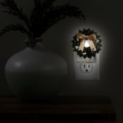 magical wreath scentplug plugged into outlet image number 4