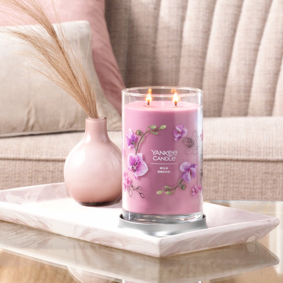 wild orchid signature large tumbler candle on table
