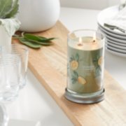 sage and citrus signature large tumbler candle on table image number 4