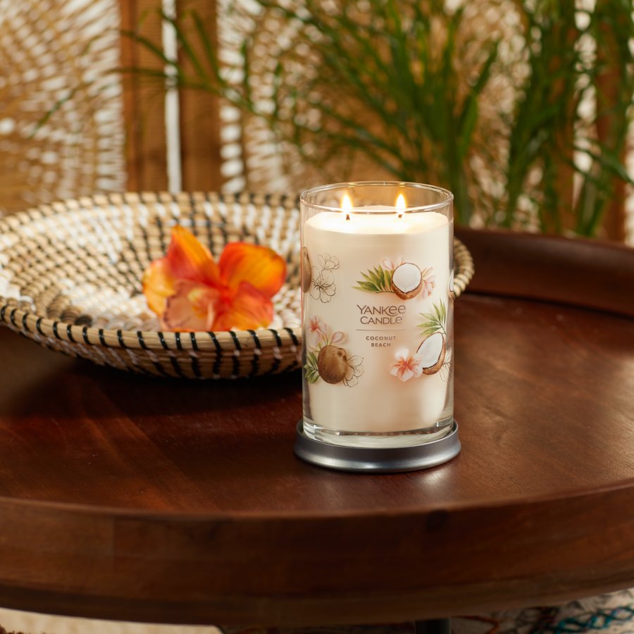 coconut beach signature large tumbler candle on table
