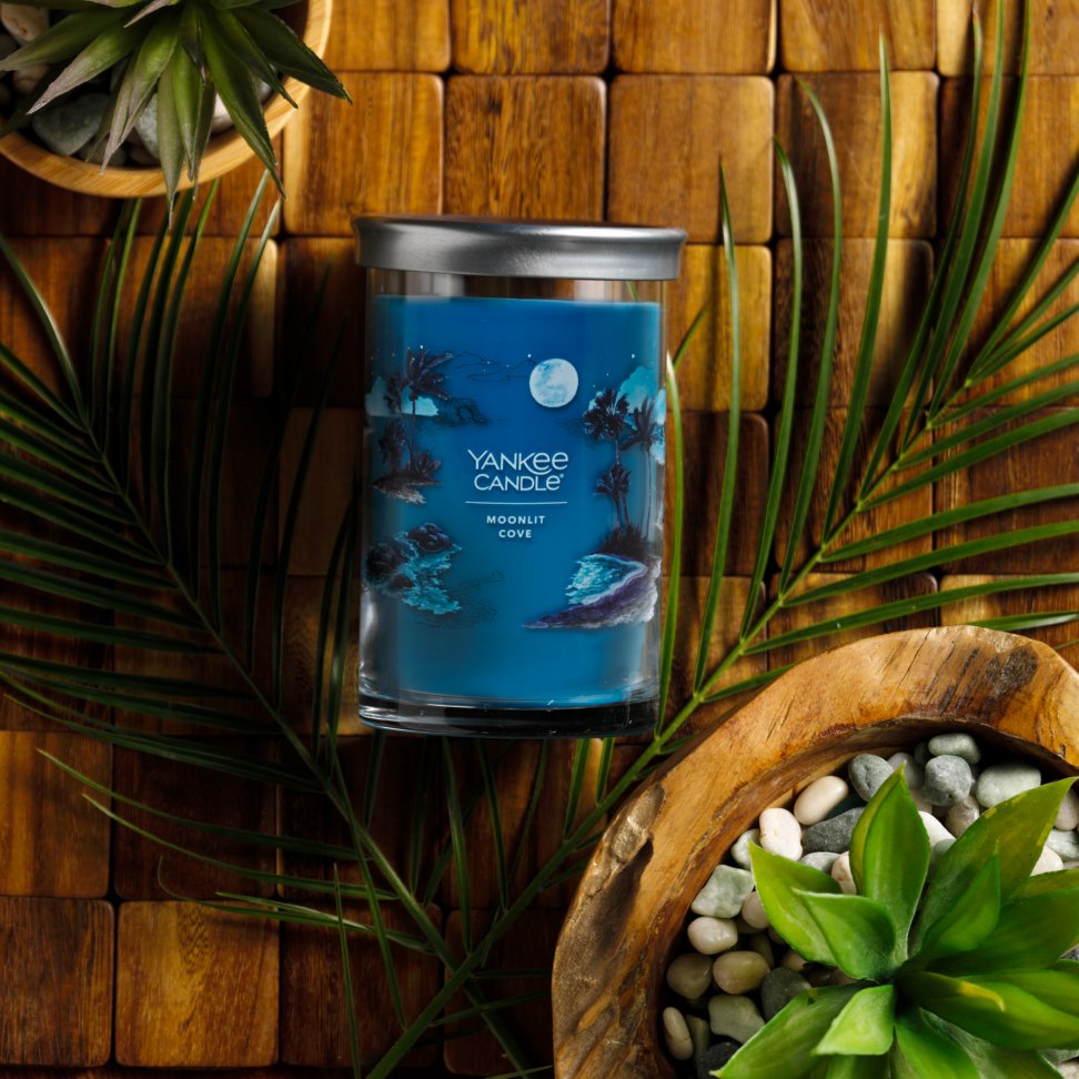 moonlit cove signature large tumbler candle on table