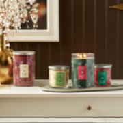 red apple wreath and balsam and cedar large tumbler candles with christmas cookie and sparkling cinnamon small tumbler candles image number 3