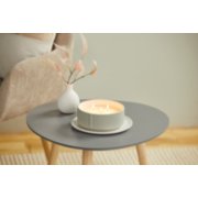three wick minimalist candle on gray side table image number 4