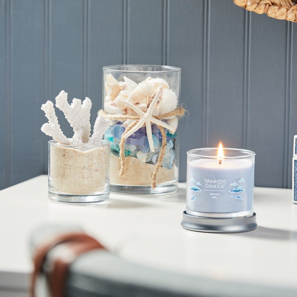 ocean air signature small tumbler candle on table