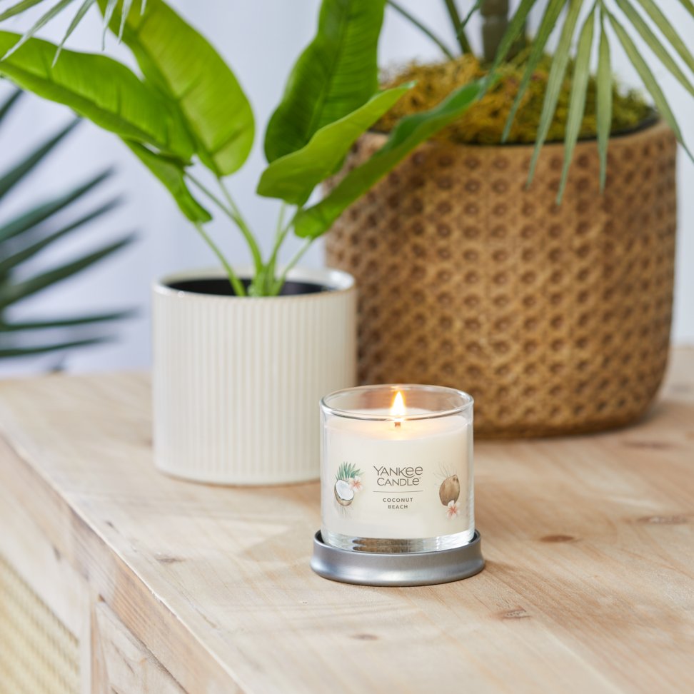 coconut beach signature small tumbler candle on table