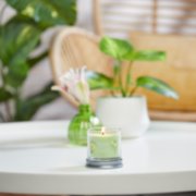 pineapple cilantro signature small tumbler candle on table image number 4