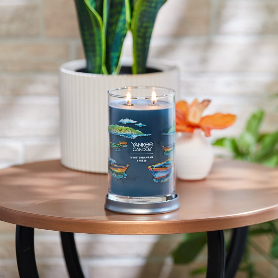 mediterranean breeze signature large tumbler candle on table