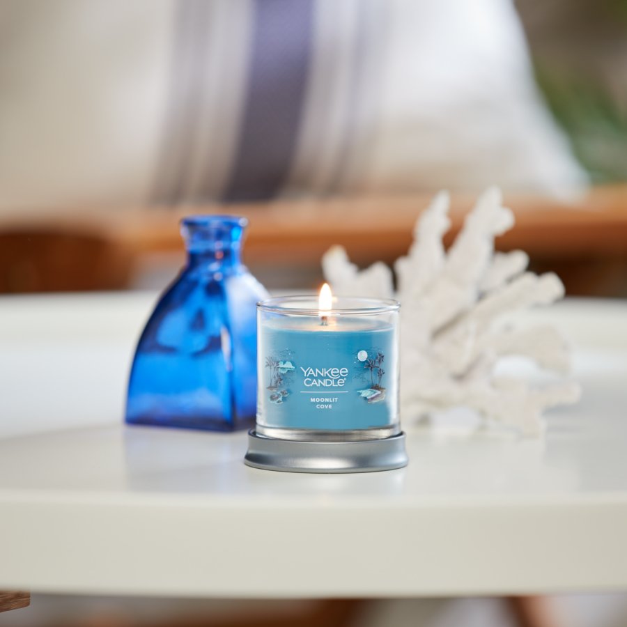 moonlit cove signature small tumbler candle on table