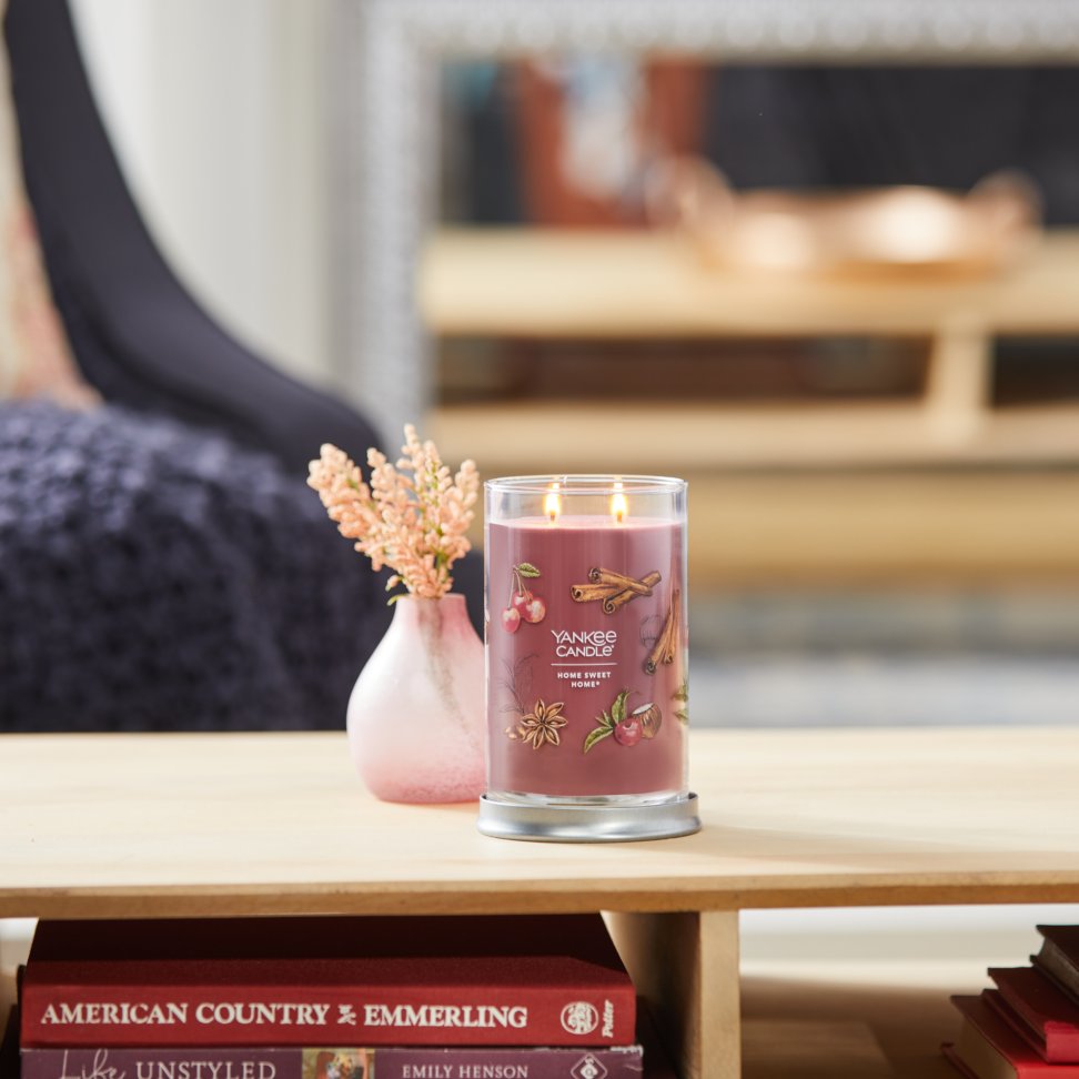 home sweet home signature large tumbler candle on coffee table