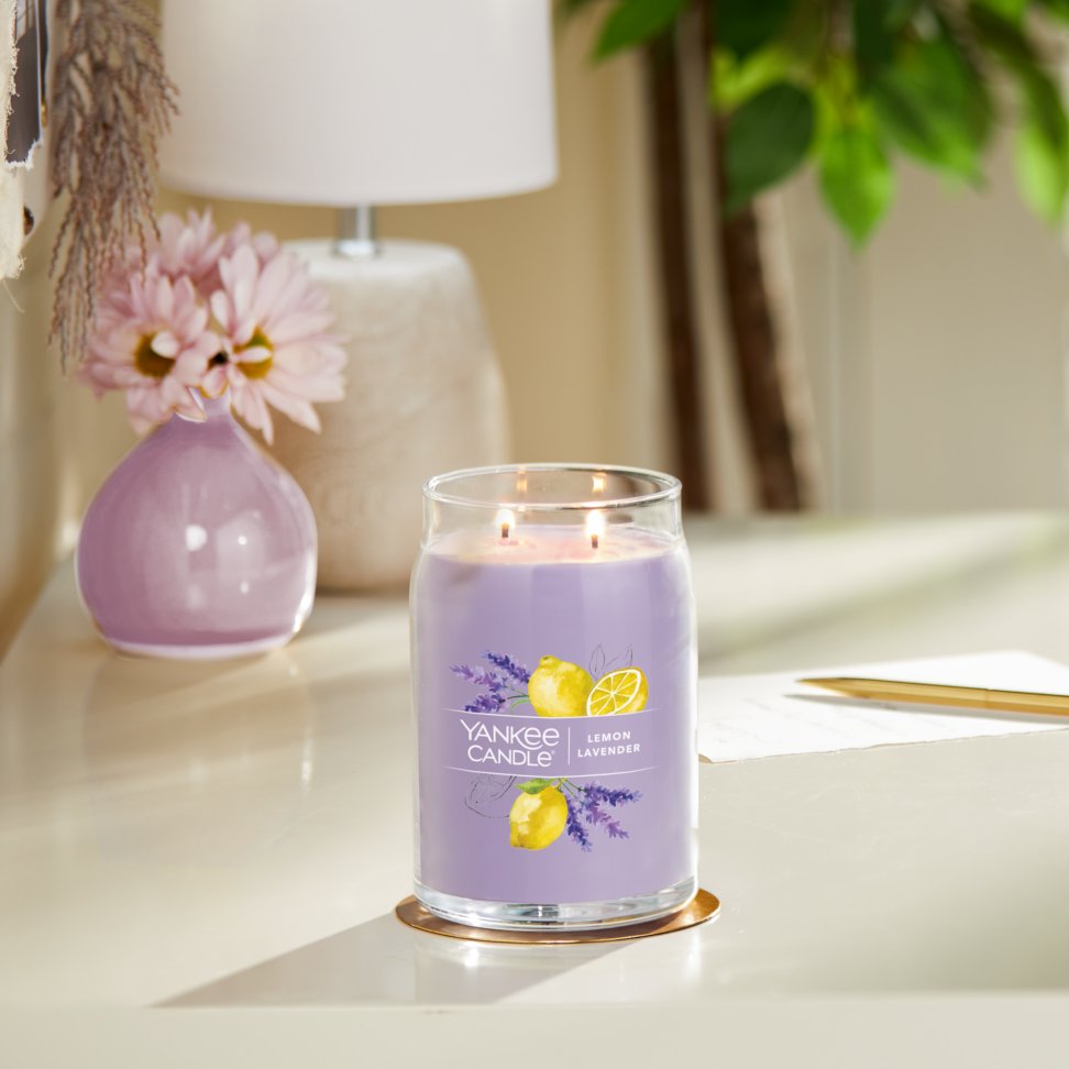 lemon lavender signature large jar candle on table in living room