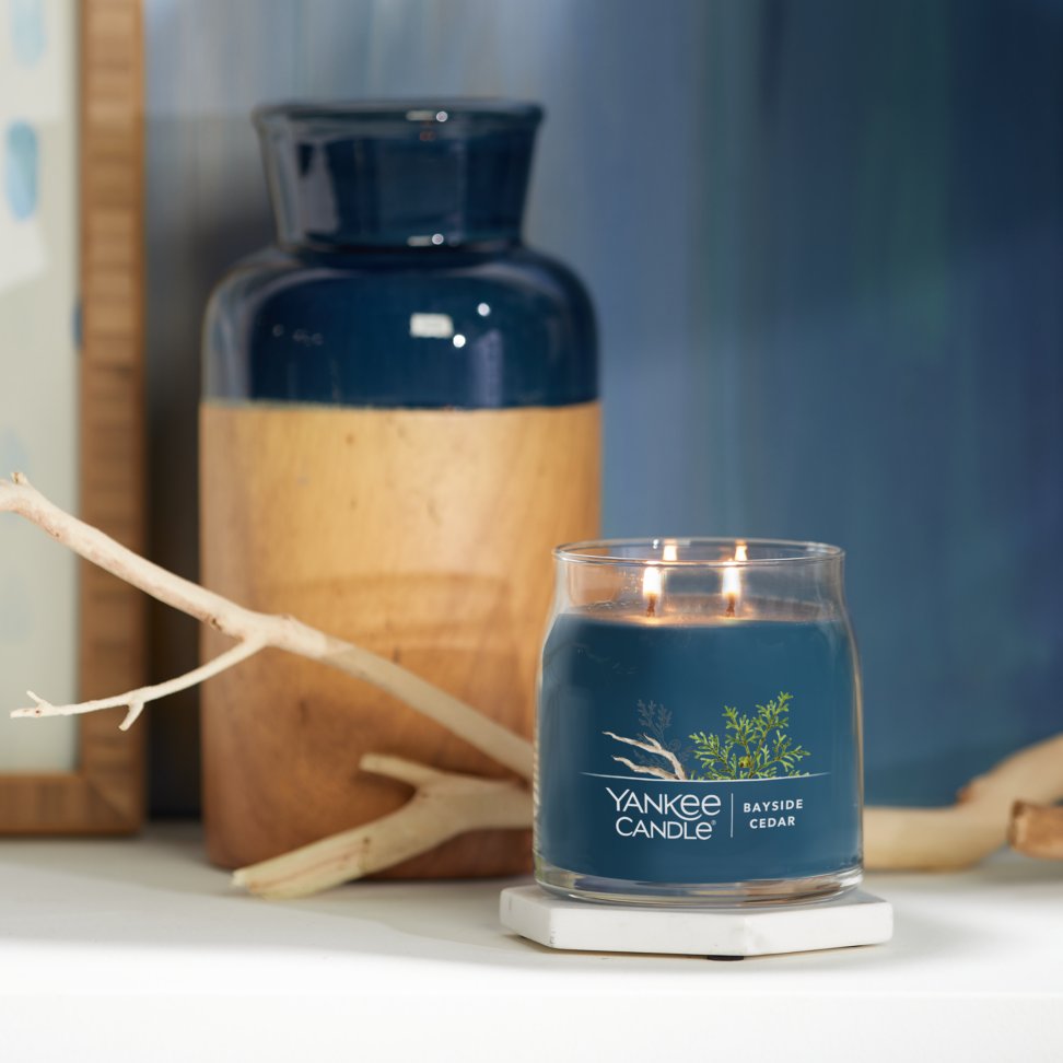 bayside cedar signature medium jar candle on table