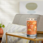 honey clementine signature large tumbler candle lit on side table image number 4