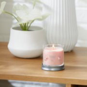 pink sands signature small tumbler candle lit on side table image number 4