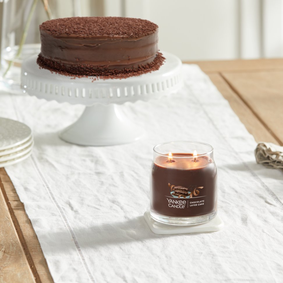 chocolate layer cake signature medium jar candle on table