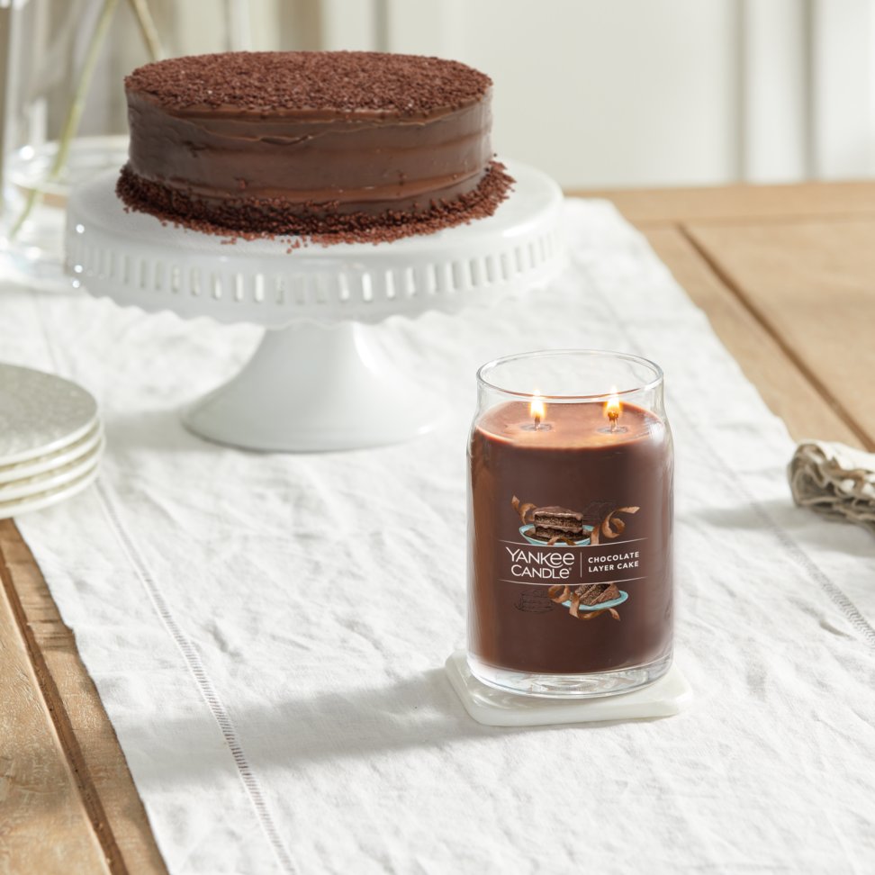 chocolate layer cake signature large jar candle on table