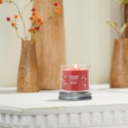 sparkling cinnamon signature small tumbler candle on mantle image number 3