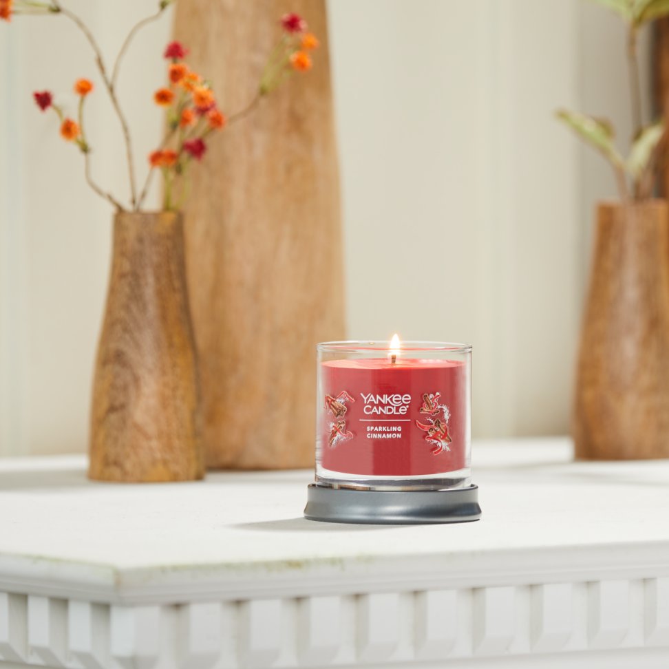 sparkling cinnamon signature small tumbler candle on mantle