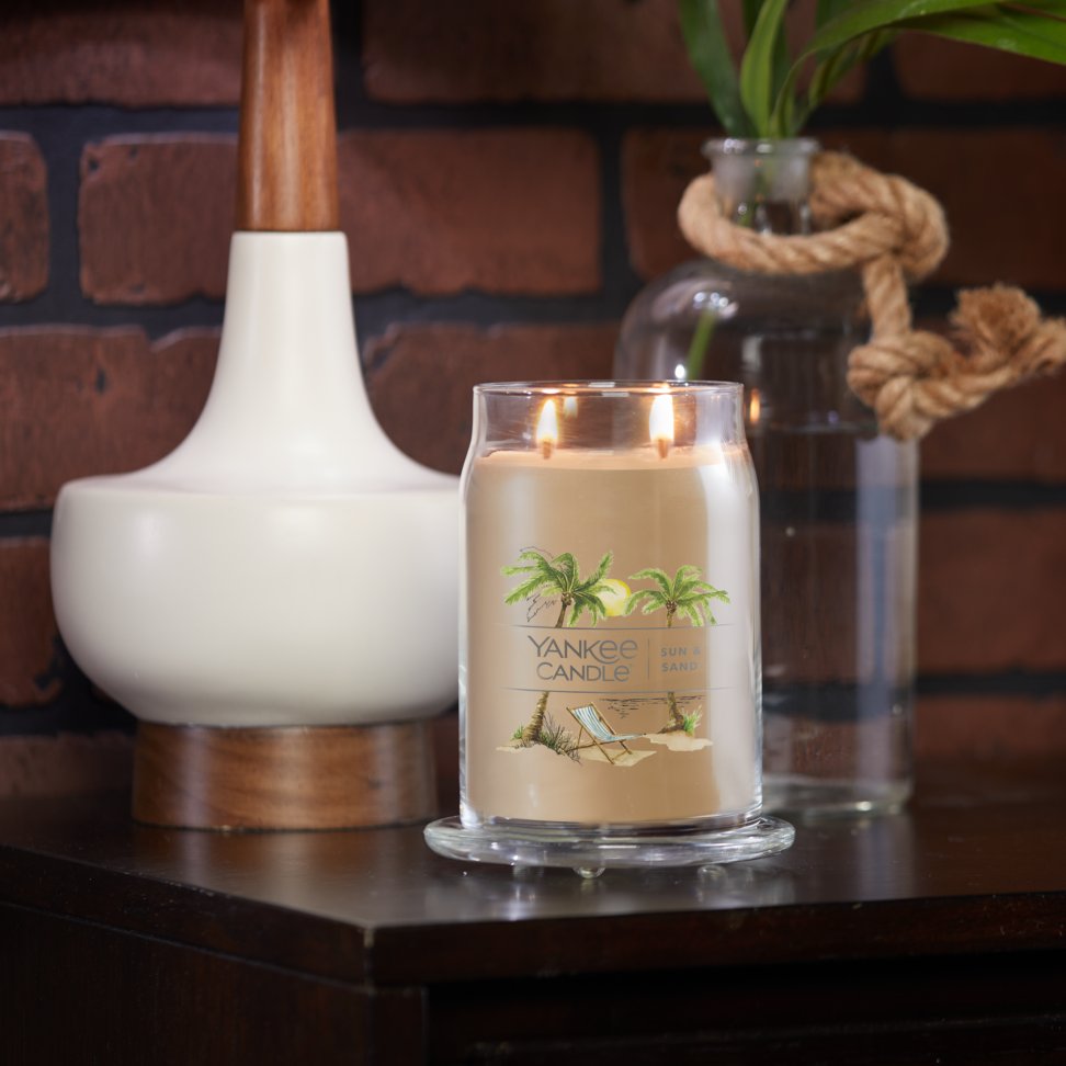 sun and sand signature large jar candle on table
