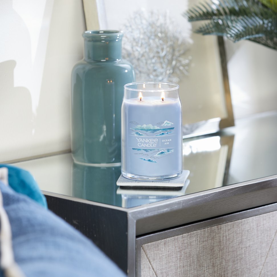 ocean air signature large jar candle on table