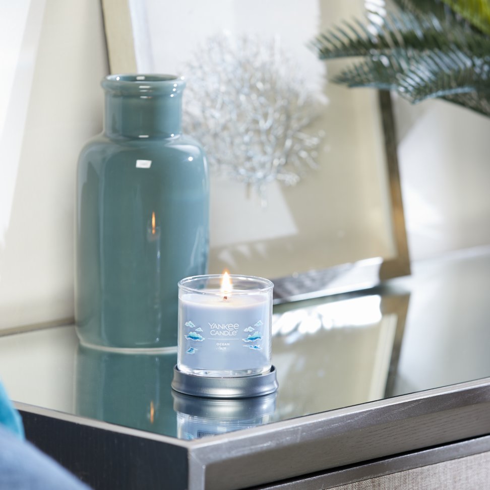 ocean air signature small tumbler candle on table