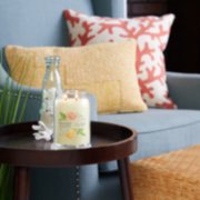 juicy citrus and sea salt signature large jar candle on table image number 4