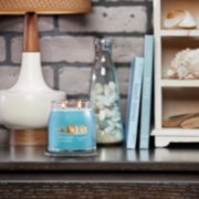 catching rays signature medium jar candle on table image number 4