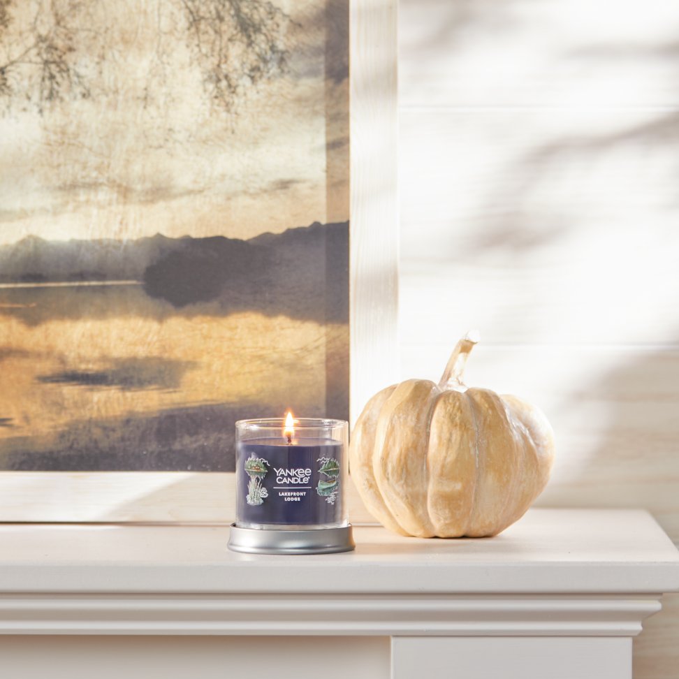 lakefront lodge signature small tumbler candle on mantle