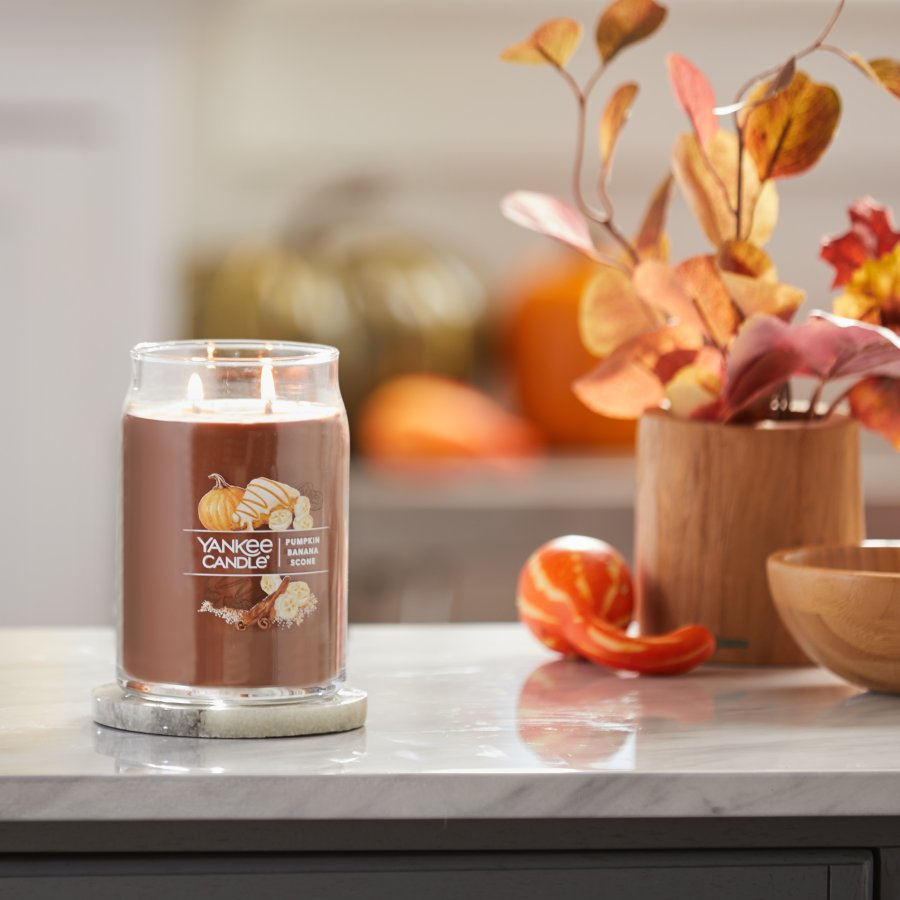 pumpkin banana scone signature large jar candle on counter in kitchen