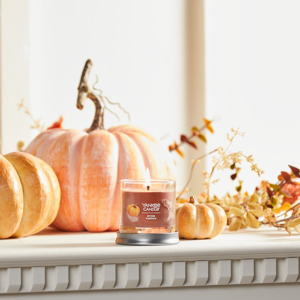spiced pumpkin signature small tumbler candle on mantle
