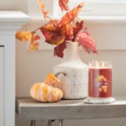 apple pumpkin signature large jar candle on table image number 4