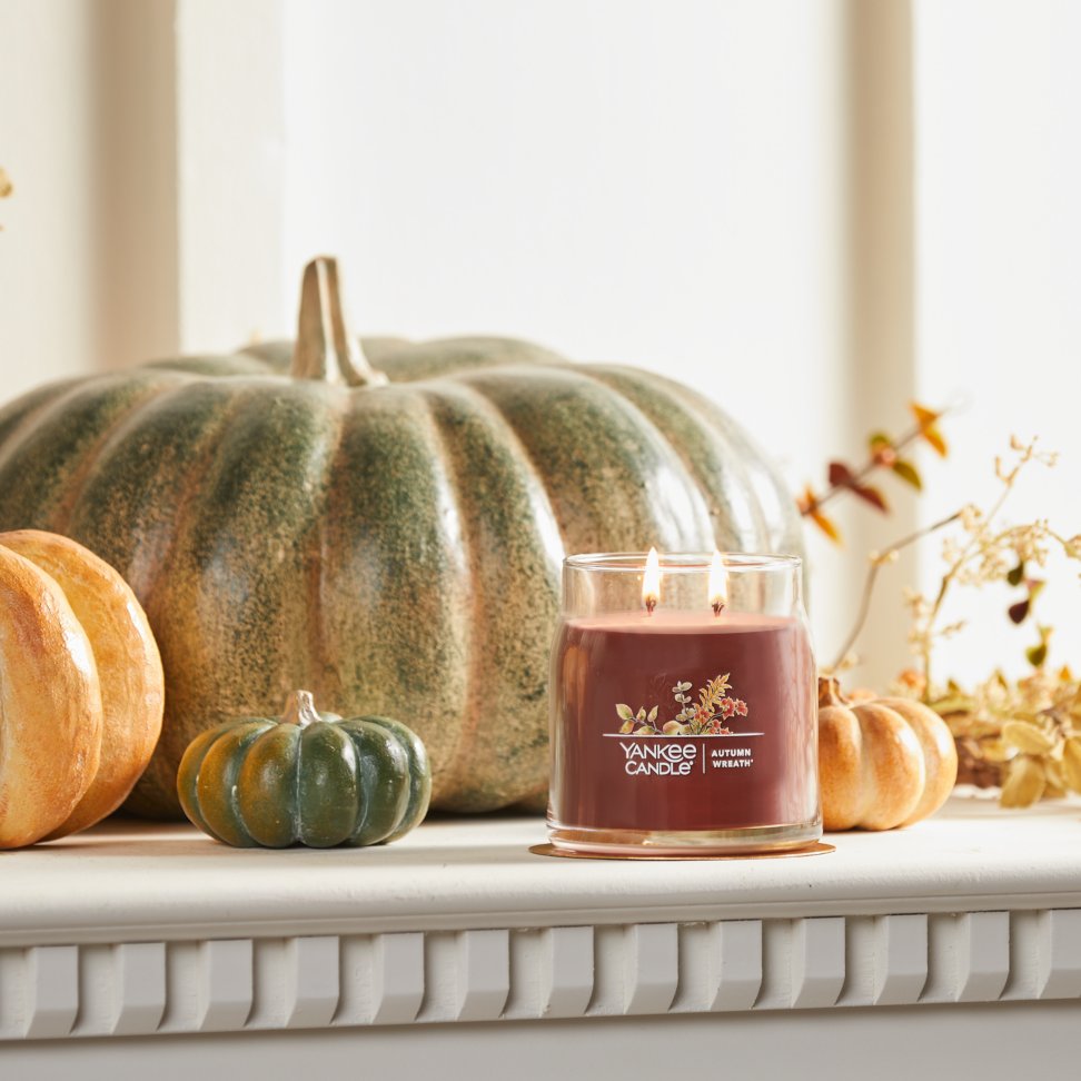 autumn wreath signature medium jar candle on mantle