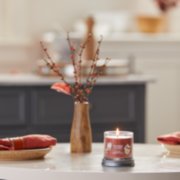 sugared cinnamon apple signature small tumbler candle on kitchen table image number 4