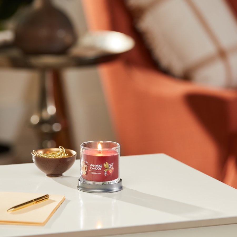 ciderhouse signature small tumbler candle on table in living room