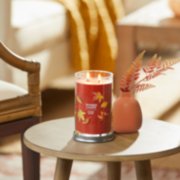 autumn leaves signature large tumbler candle on table image number 4