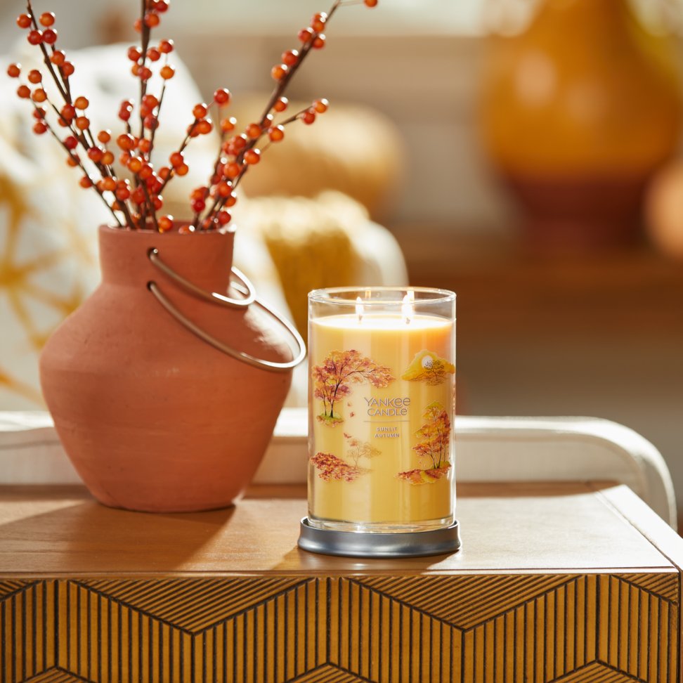 sunlit autumn signature large tumbler candle on table