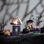 haunted hayride original large jar candle with yankee candle trio halloween candle and halloween accents on table image number 1